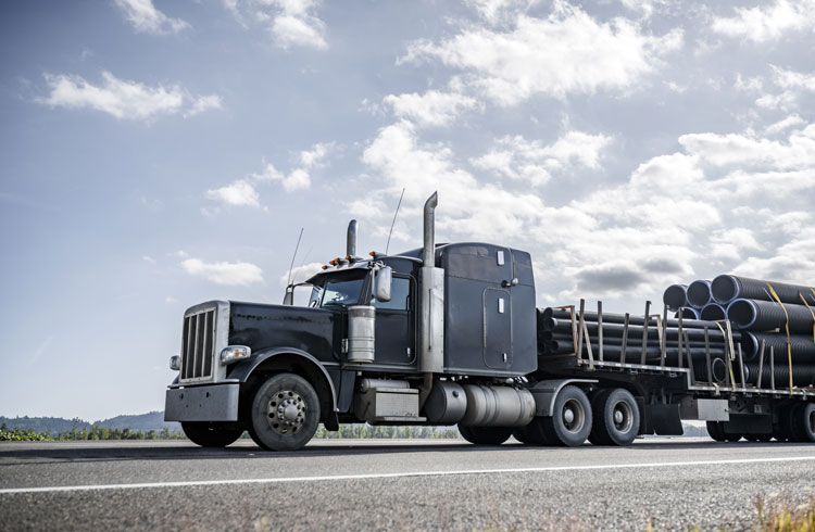 semi hauling well casings